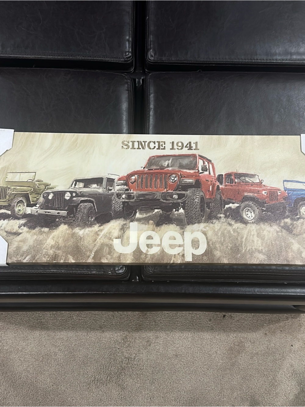 Jeep Canvas Art with Red, Black, Blue, Green, Tan Vehicles. Approximately 10x27